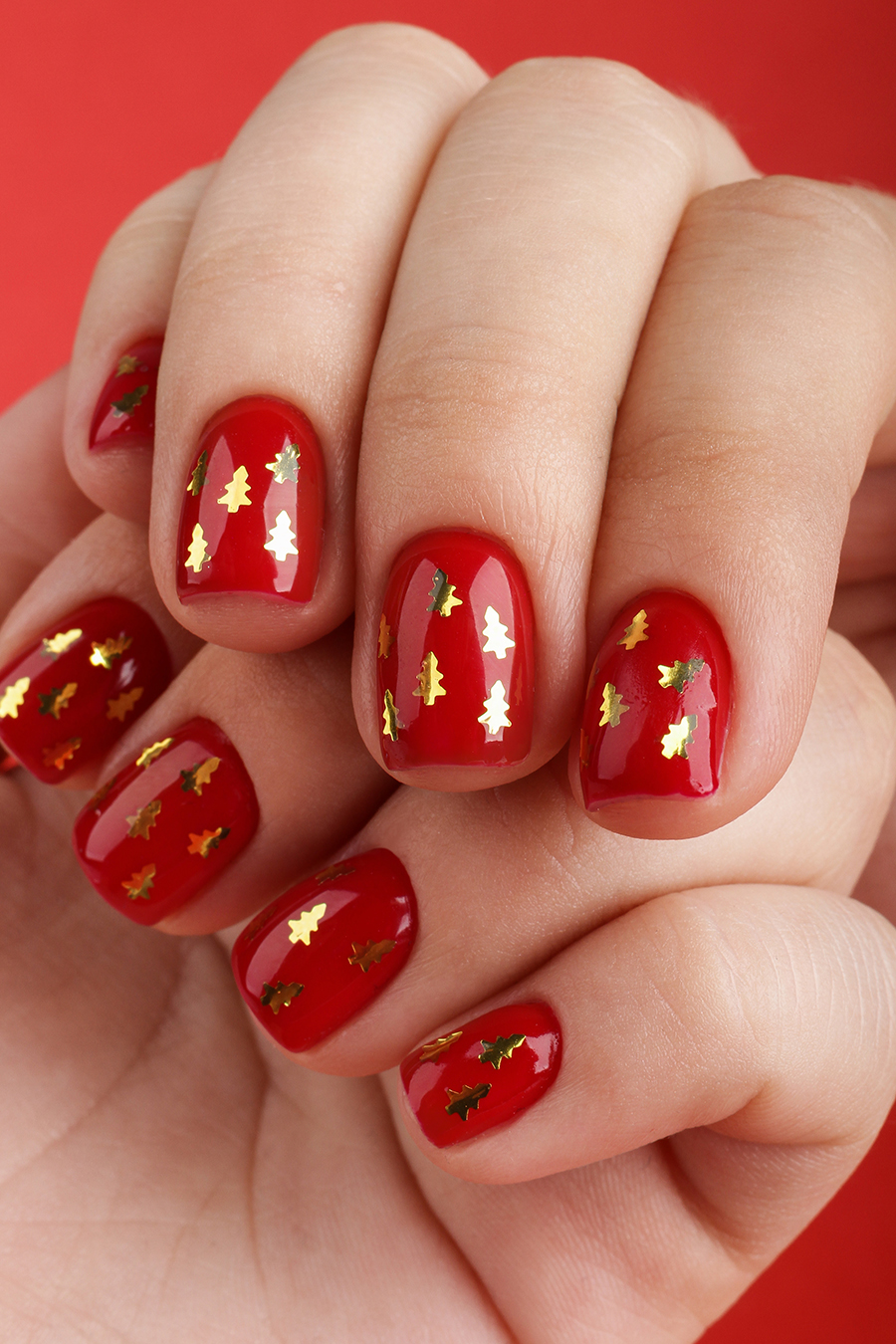 Дизайн ногтей. Товар: RockNail, ELKA - топ с блестящими арт-частицами в форме ёлочек (Golden Lights), 10 мл